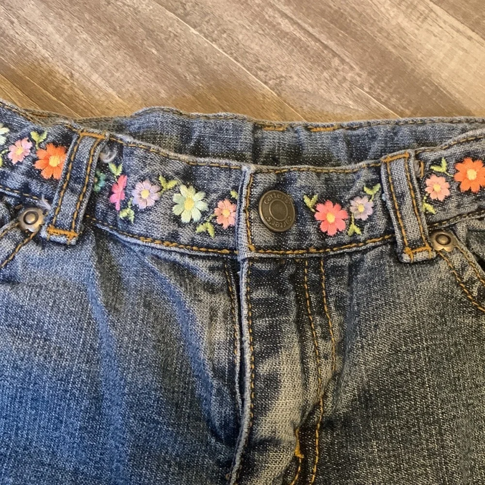 Carter’s girls jeans with embroidered flower waistband. size 4t